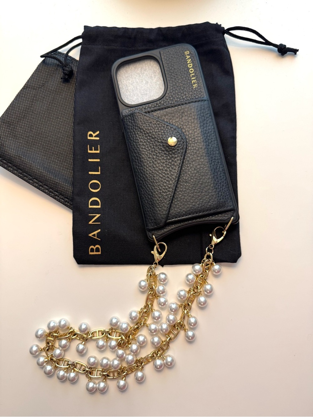 Bandolier iPhone 15 pro max Emelia case and long pearl wristlet